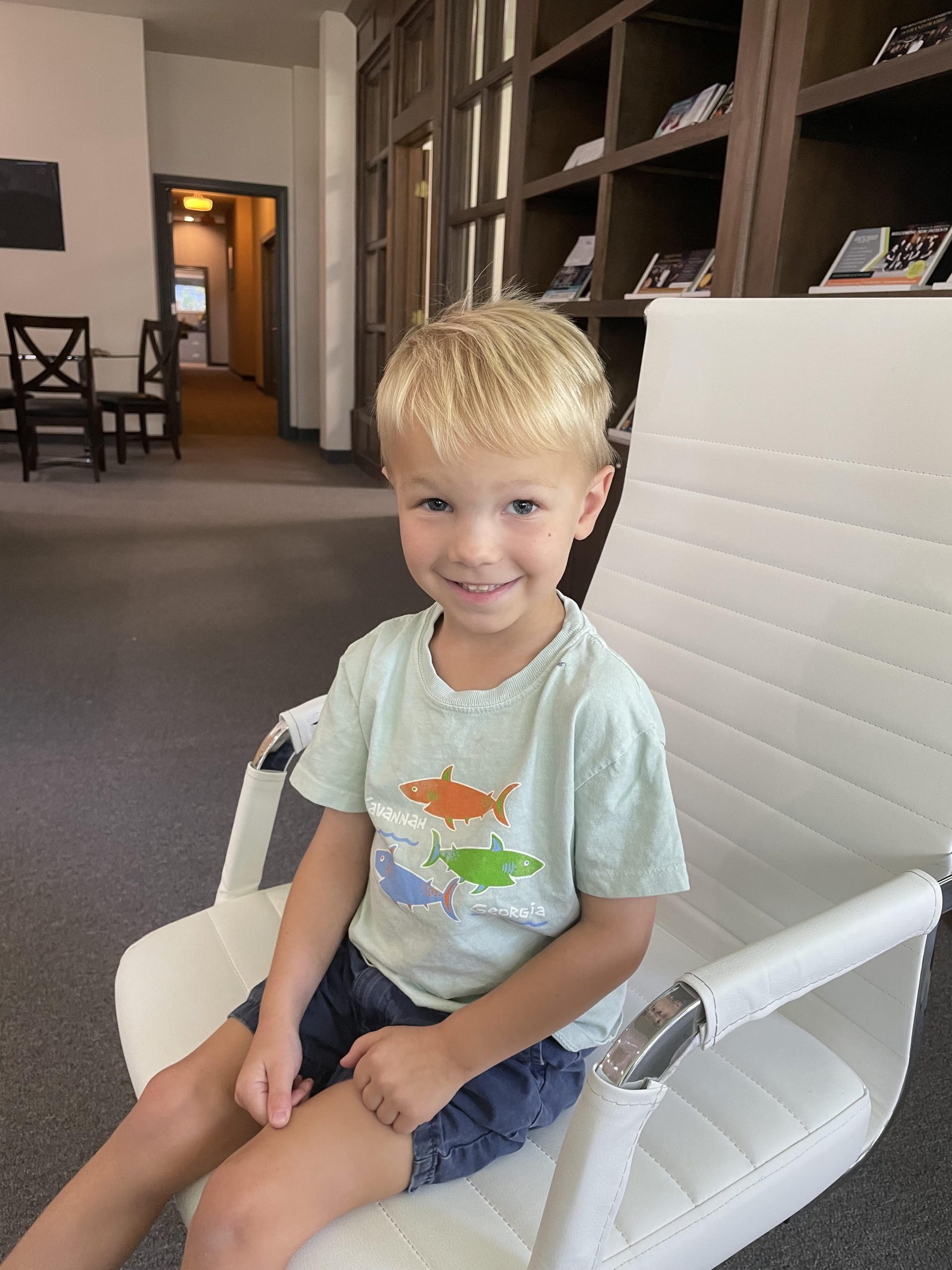 Photo of Young Connor Smiling in His Chair